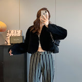 Manteau en fourrure à col en V