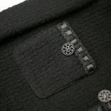 Veste épaisse noire à fleurs