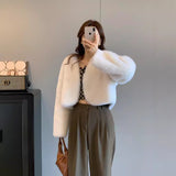 Manteau en fourrure à col en V