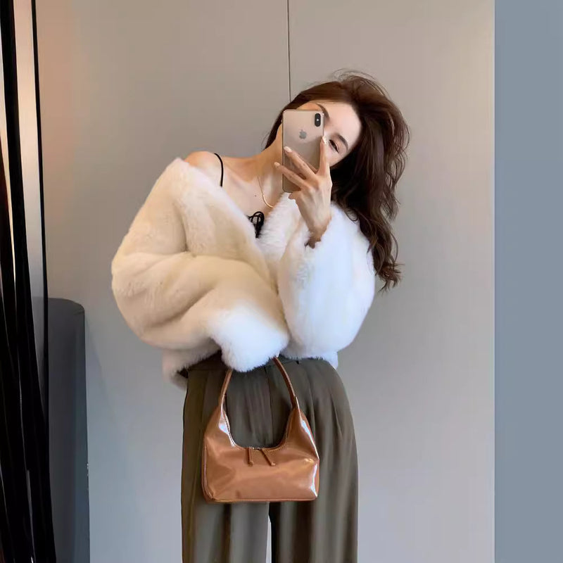 Manteau en fourrure à col en V