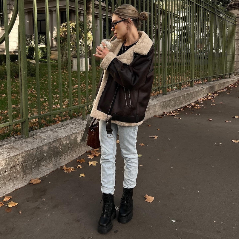 Veste longue en fourrure à multiples zips